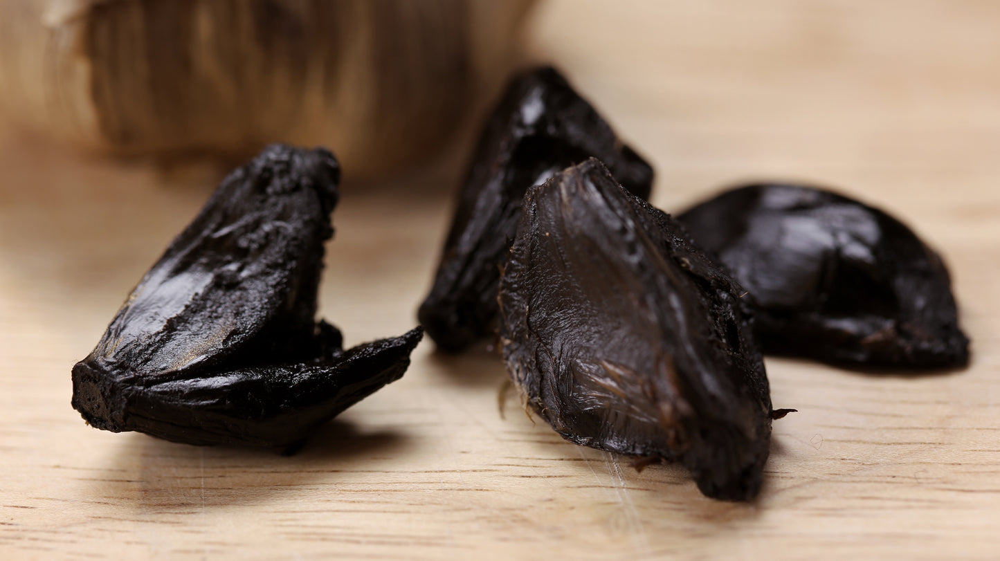 Black Garlic Bulk Bare Cloves (16 oz. Deli Container)