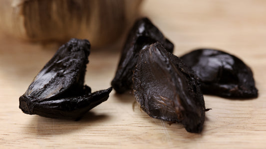 Black Garlic Bulk Bare Cloves (16 oz. Deli Container)